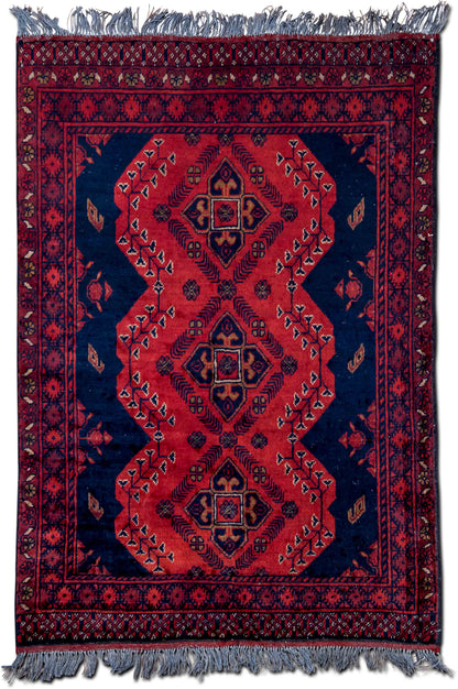 Tribal-Style Red & Blue Lozenge Wool Rug, 4′9″ × 3′9″